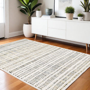 Homeroots 5' Elegant Ivory And Gold Striped Power Loom Area Rug - Stain Resistant, Perfect For Any Decor 4' X 6' Polyester 575040