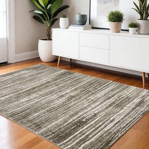 Homeroots 5' Distressed Brown Striped Area Rug – Stylish, Stain-resistant Comfort For Family Spaces & Pets 4' X 6' Polyester 575055
