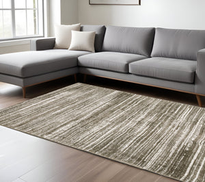 Homeroots 5' Distressed Brown Striped Area Rug – Stylish, Stain-resistant Comfort For Family Spaces & Pets 8' X 11' Polyester 575057