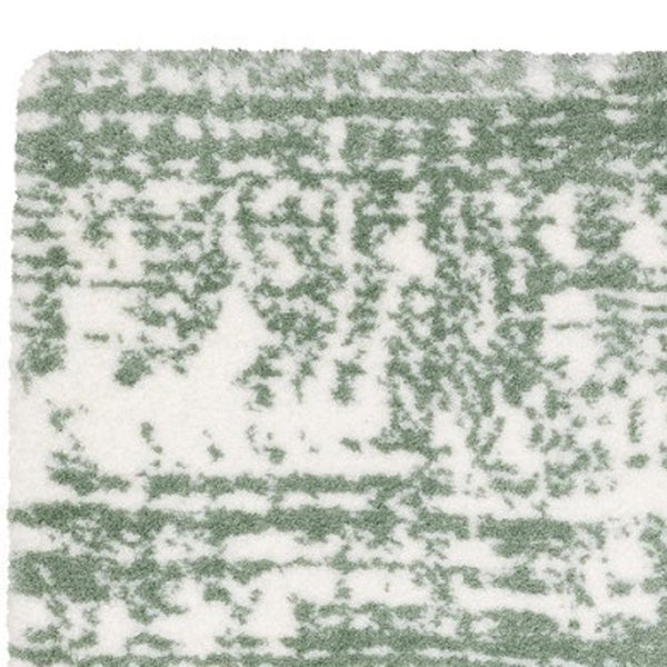 Homeroots 5' Abstract Green And Ivory Area Rug - Perfect For Kids And Pets, Stain Resistant, Artful Design 5' X 8' Polyester 575068