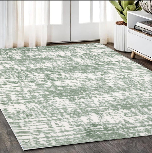Homeroots 5' Abstract Green And Ivory Area Rug - Perfect For Kids And Pets, Stain Resistant, Artful Design 5' X 8' Polyester 575068