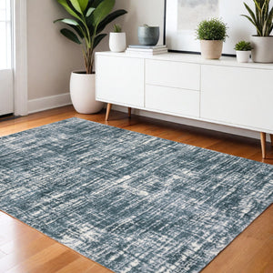 Homeroots 5' Abstract Green And Ivory Area Rug - Perfect For Kids And Pets, Stain Resistant, Artful Design 4' X 6' Polyester 575070