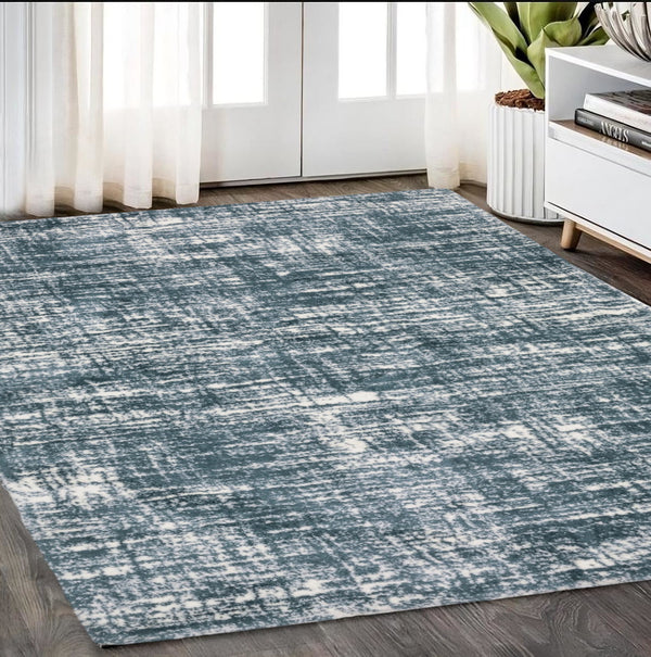 Homeroots 5' Abstract Green And Ivory Area Rug - Perfect For Kids And Pets, Stain Resistant, Artful Design 5' X 8' Polyester 575071