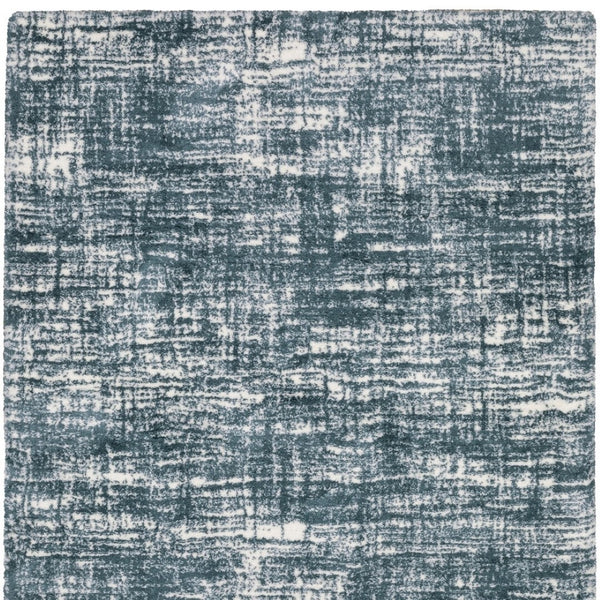 Homeroots 5' Abstract Green And Ivory Area Rug - Perfect For Kids And Pets, Stain Resistant, Artful Design 7' X 10' Polyester 575072