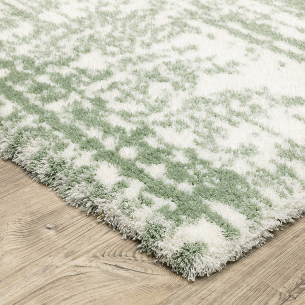 Homeroots 5' Abstract Green And Ivory Area Rug - Perfect For Kids And Pets, Stain Resistant, Artful Design 10' X 13' Polyester 575074