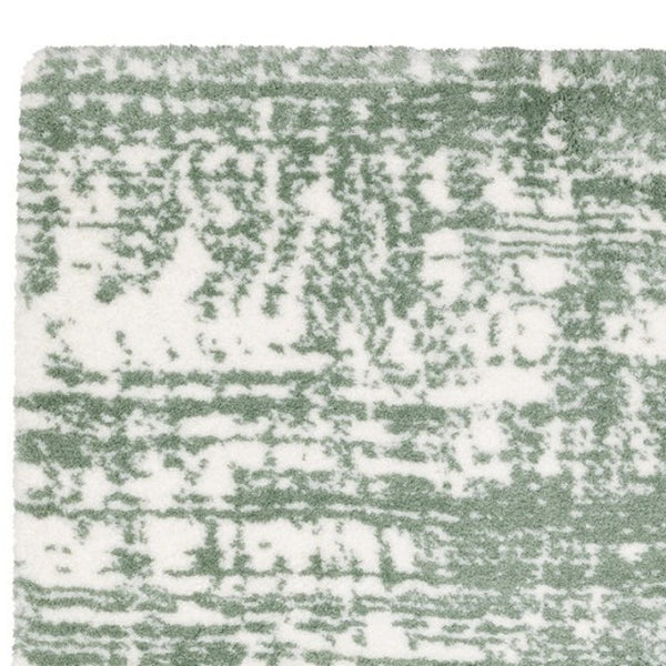 Homeroots 5' Abstract Green And Ivory Area Rug - Perfect For Kids And Pets, Stain Resistant, Artful Design 4' X 6' Polyester 575075