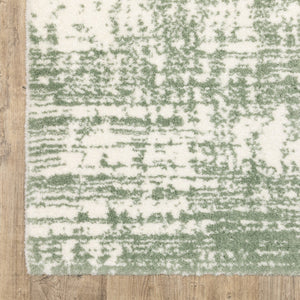 Homeroots 5' Abstract Green And Ivory Area Rug - Perfect For Kids And Pets, Stain Resistant, Artful Design 7' X 10' Polyester 575076