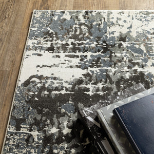 Homeroots 3' Ivory Abstract Area Rug - Stain Resistant, Stylish Design For Home Décor, Perfect For Kids & Pets 3' X 5' Polypropylene,Polyester 575263