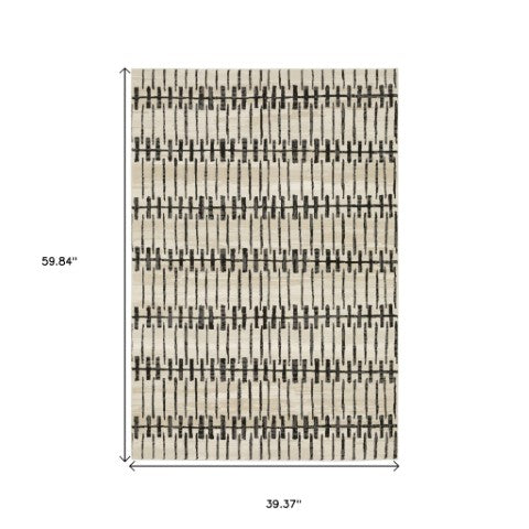 Homeroots 3' Inviting Beige And Black Geometric Area Rug – Stain Resistant, Perfect For Kids And Pets! 3' X 5' Polypropylene,Polyester 575264