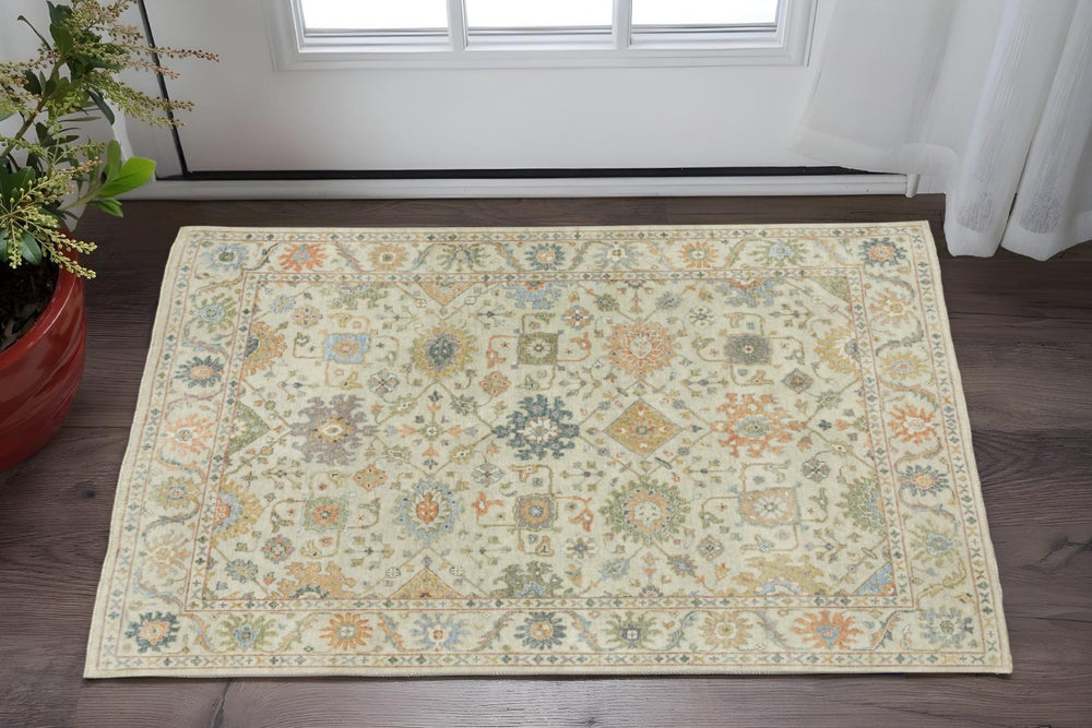 HomeRoots 2' Hand Knotted Wool Oriental Area Rug in Beige and Green – Timeless Charm for Small Spaces 2' X 3' 575286