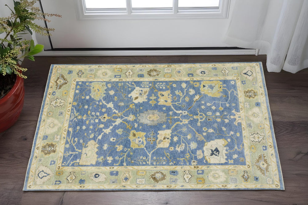 HomeRoots 2' Hand-Knotted Blue and Green Wool Oriental Area Rug with Fringed Edges for Cozy Spaces 2' X 3' 575289