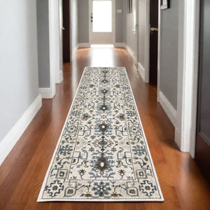 HomeRoots 5' Elegant Ivory Oriental Area Rug with Burnt Orange and Blue Accents - Stain & Fade Resistant 8' Runner 575436