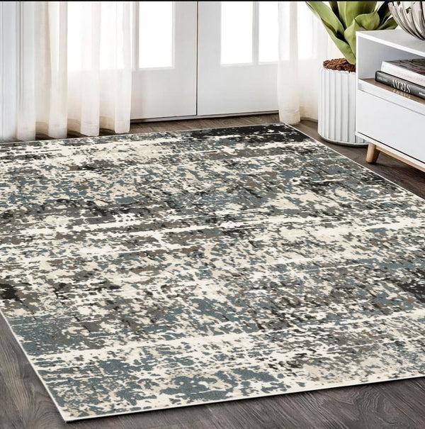 Homeroots 3' Ivory Abstract Area Rug - Stain Resistant, Stylish Design For Home Décor, Perfect For Kids & Pets 5' X 8' Polypropylene,Polyester 575455