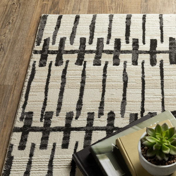 Homeroots 3' Inviting Beige And Black Geometric Area Rug – Stain Resistant, Perfect For Kids And Pets! 8' Runner Polypropylene,Polyester 575458