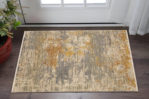 HomeRoots 3' Elevate Your Home Aesthetic with a Beige and Gold Abstract Area Rug Featuring Elegant Fringe 3' X 5' 575469
