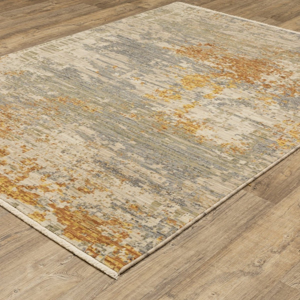 HomeRoots 3' Elevate Your Home Aesthetic with a Beige and Gold Abstract Area Rug Featuring Elegant Fringe 3' X 5' 575469