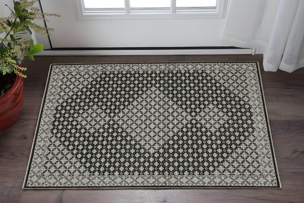 HomeRoots 5' Modern Black and Gray Diamond Area Rug with Stylish Fringe for Durable, Cozy Living Spaces 3' X 5' 575526