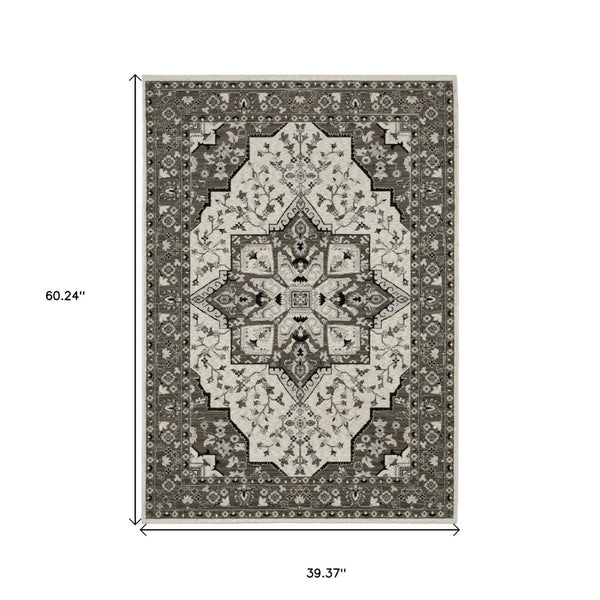 HomeRoots 5' Ivory and Gray Medallion Area Rug with Fringe – Timeless Style, Stain-Resistant, Perfect for Any Space 3' X 5' 575532