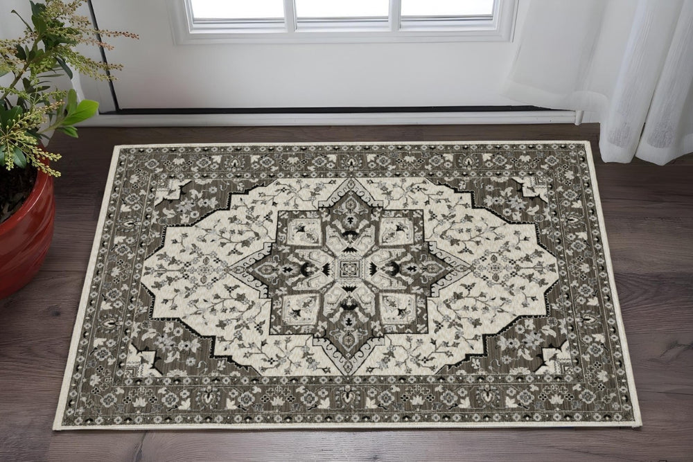 HomeRoots 5' Ivory and Gray Medallion Area Rug with Fringe – Timeless Style, Stain-Resistant, Perfect for Any Space 3' X 5' 575532