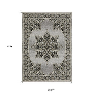 HomeRoots 3' Gray and Black Medallion Area Rug with Fringe - Timeless Design for Elegant and Cozy Spaces 3'3" x 5' 575534