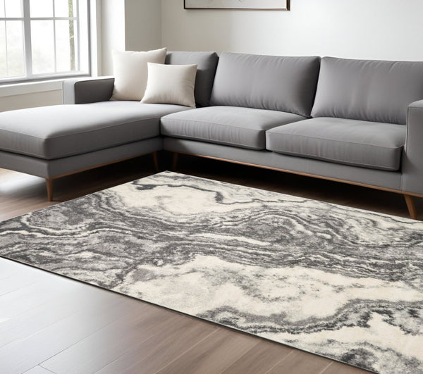 HomeRoots 3' Gray and Black Medallion Area Rug with Fringe - Timeless Design for Elegant and Cozy Spaces 3'3" x 5' 575534