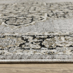 HomeRoots 3' Gray and Black Medallion Area Rug with Fringe - Timeless Design for Elegant and Cozy Spaces 3'3" x 5' 575534