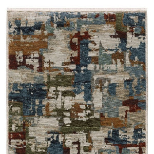 HomeRoots 10' Abstract Distressed Area Rug in Beige with Rust and Teal Hues, Fringe Edges for Timeless Charm 8' Runner 575590
