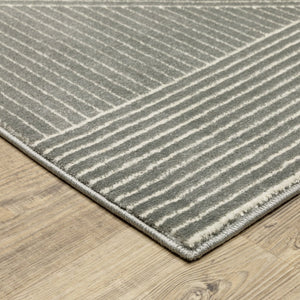 HomeRoots 3' Gray and Ivory Geometric Area Rug - Modern, Durable Design Perfect for High-Traffic Spaces 7' X 10' 575611