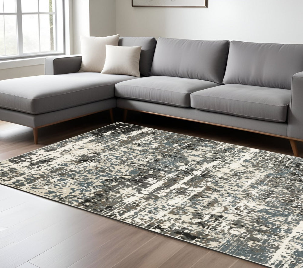 HomeRoots 3' Elevate Your Space with a Durable Ivory and Gray Abstract Area Rug for Modern Living Rooms 7' X 10' 575613