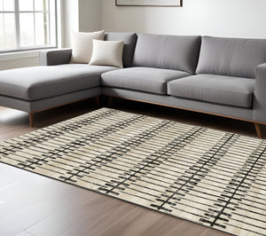 Homeroots 3' Inviting Beige And Black Geometric Area Rug – Stain Resistant, Perfect For Kids And Pets! 7' X 10' Polypropylene,Polyester 575614