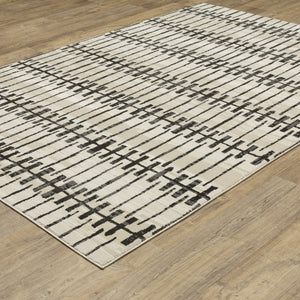 Homeroots 3' Inviting Beige And Black Geometric Area Rug – Stain Resistant, Perfect For Kids And Pets! 7' X 10' Polypropylene,Polyester 575614