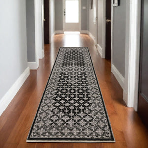 HomeRoots 5' Modern Black and Gray Diamond Area Rug with Stylish Fringe for Durable, Cozy Living Spaces 8' Runner 575625