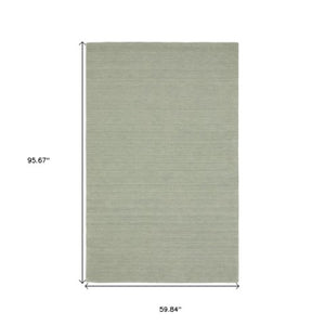 Homeroots 5' Teal Wool Hand Tufted Area Rug - Elevate Your Space With Style, Warmth, And Versatility Today! 5' X 8' Wool 575648