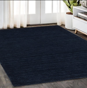 Homeroots 5' Teal Wool Hand Tufted Area Rug - Elevate Your Space With Style, Warmth, And Versatility Today! 5' X 8' Wool 575654