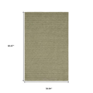 Homeroots 5' Teal Wool Hand Tufted Area Rug - Elevate Your Space With Style, Warmth, And Versatility Today! 5' X 8' Wool 575656