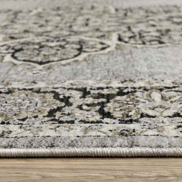 HomeRoots 3' Gray and Black Medallion Area Rug with Fringe - Timeless Design for Elegant and Cozy Spaces 2'3" x 7'6" 575661