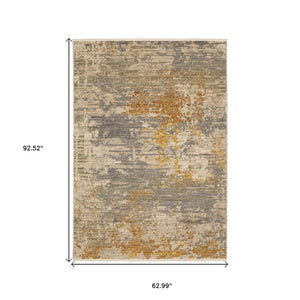 HomeRoots 3' Elevate Your Home Aesthetic with a Beige and Gold Abstract Area Rug Featuring Elegant Fringe 5' X 8' 575664