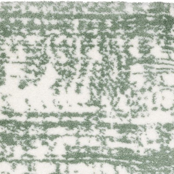 Homeroots 5' Abstract Green And Ivory Area Rug - Perfect For Kids And Pets, Stain Resistant, Artful Design 8' Runner Polyester 575710