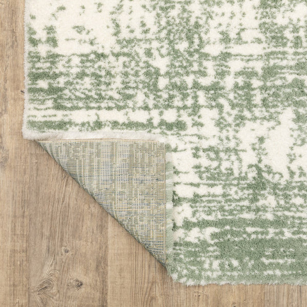 Homeroots 5' Abstract Green And Ivory Area Rug - Perfect For Kids And Pets, Stain Resistant, Artful Design 8' Runner Polyester 575710