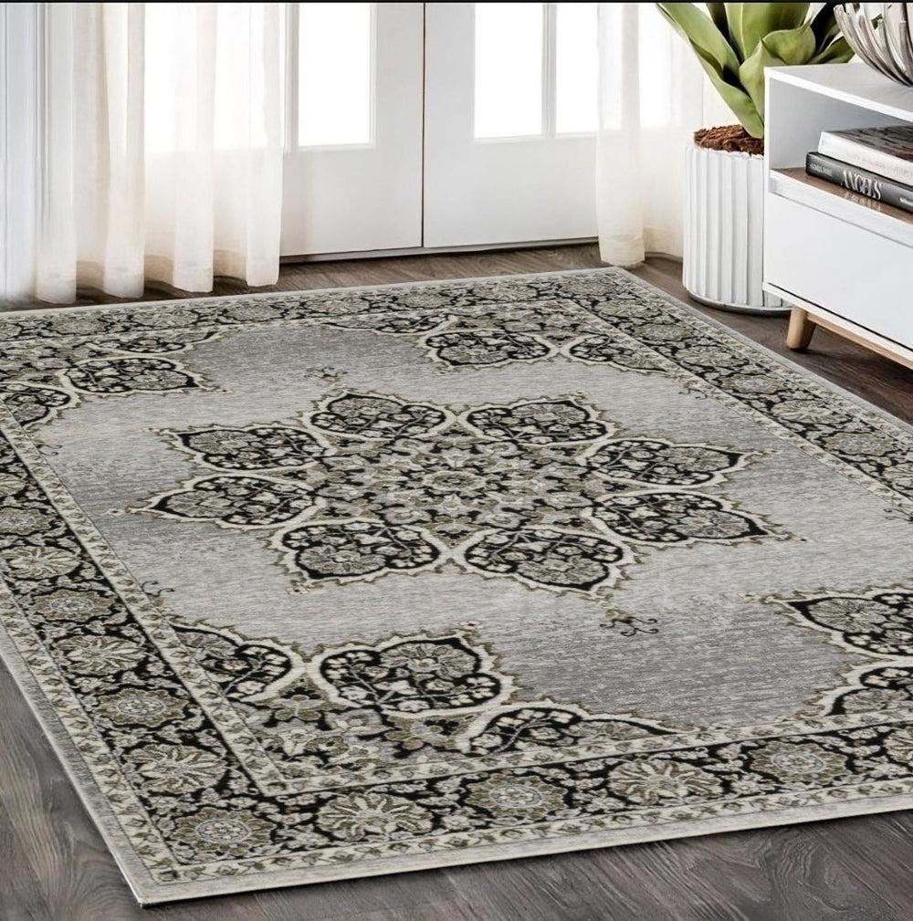 HomeRoots 3' Gray and Black Medallion Area Rug with Fringe - Timeless Design for Elegant and Cozy Spaces 5' X 8' 575750