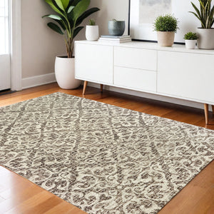 Homeroots 5' Brown Floral Wool Hand Tufted Area Rug – Elevate Your Space With Style And Sophistication 4' X 6' Wool 575757