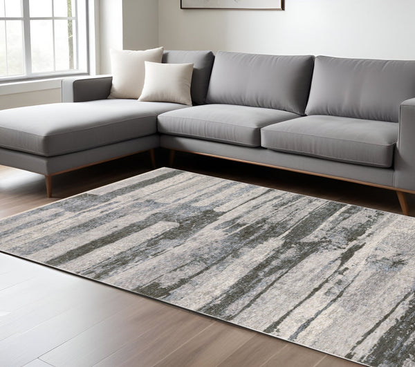 Homeroots 3' Gray Abstract Power Loom Area Rug With Fringe - Stylish, Stain-resistant Design For Any Decor 7' X 10' Polyester 575884