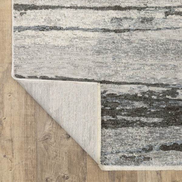 Homeroots 3' Gray Abstract Power Loom Area Rug With Fringe - Stylish, Stain-resistant Design For Any Decor 7' X 10' Polyester 575884