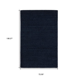 Homeroots 5' Teal Wool Hand Tufted Area Rug - Elevate Your Space With Style, Warmth, And Versatility Today! 6' X 9' Wool 575888