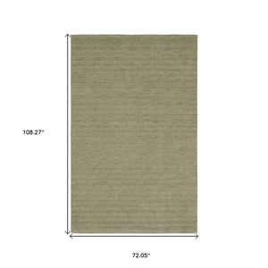 HomeRoots 5' Hand-Tufted Wool Area Rug in Teal and Blue - Cozy, Durable Design for Any Room or Space 6' X 9' 575889