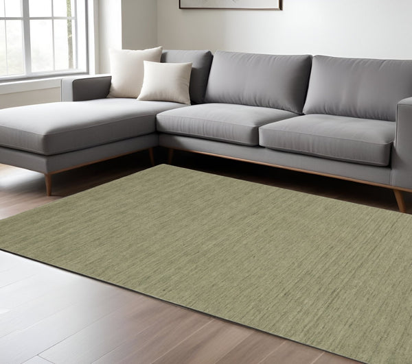 HomeRoots 5' Hand-Tufted Wool Area Rug in Teal and Blue - Cozy, Durable Design for Any Room or Space 6' X 9' 575889