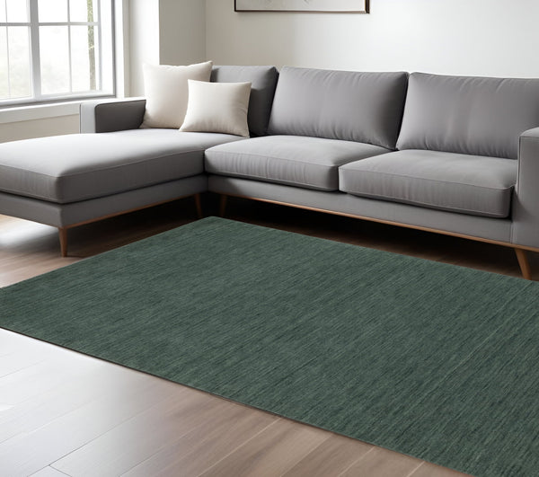 Homeroots 5' Teal Wool Hand Tufted Area Rug - Elevate Your Space With Style, Warmth, And Versatility Today! 6' X 9' Wool 575890