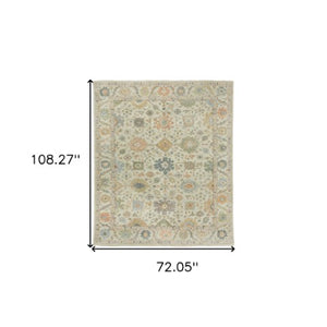 Homeroots 2' Hand Knotted Beige And Green Wool Oriental Area Rug With Fringe For Timeless Home Elegance 6' X 9' Wool 575892