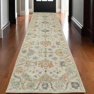 Homeroots 2' Hand Knotted Beige And Green Wool Oriental Area Rug With Fringe For Timeless Home Elegance 10' Runner Wool 575893