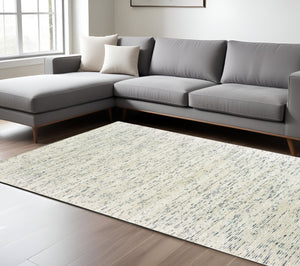 Homeroots 5' Hand Tufted Area Rug In Blue And Teal - Enhance Your Space With Comfort And Style Today! 8' X 10' Wool Blend 576186